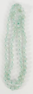 Jadeite bead necklace, single knotted, pale green.  8.4mm, lg. 30 in.