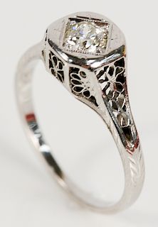 14 karat white gold filigree ring set with center diamond .30 cts.  size 7 1/2