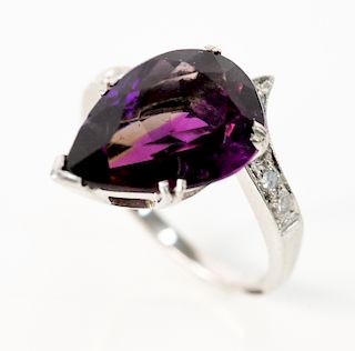 Platinum ring set with teardrop amethyst and 9 diamonds.  size 5