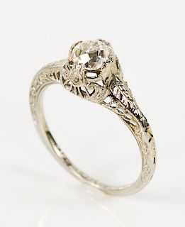 18 karat white gold and diamond ring with filigree setting, diamond approximately .50 cts.  size 7