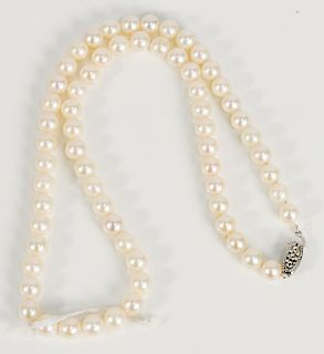 Pearl necklace with 10 karat gold clasp.  lg. 14 1/2 in.