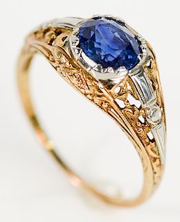 14 karat gold filigree ring set with blue stone, approximately .75 ct., approximately 6.2 x 6.6mm.  size 6 1/2