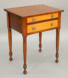 Sheraton cherry stand having two birdseye maple drawers, on turned legs, circa 1830.  ht. 28 in., top: 18 1/2" x 23 1/4"