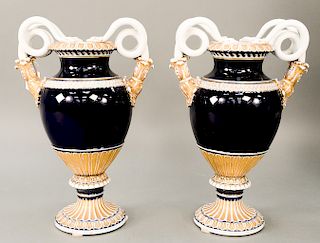 Pair of large Meissen porcelain urns, cobalt blue ground with snake handle and gilt decoration, blue crossed swords mark on bottom....