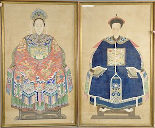 Pair of large framed ancestor portraits, color on silk, both finely painted and detailed por...