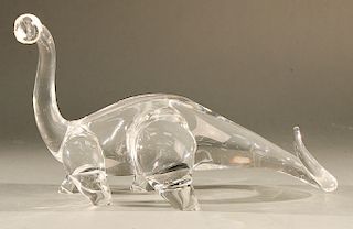 Steuben glass dinosaur, crystal sculpture in standing pose, #8135, designed by David Hills 1964 or James Houston.  ht. 7 in., lg....