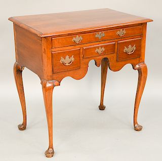 Queen Anne cherry lowboy having one long drawer over three drawers, set on cabriole legs ending in pad feet, probably Southeast Conn...