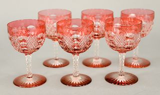 Set of six cranberry cut to clear stems.  ht. 4 5/8 in.  Provenance: Estate of Robert Rintoul, Guilford, Connecticut