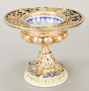 Porcelain compote mounted with sterling silver having putti, urn and wheels filigree top, marked: Sterling Tiffany & Co. France.  ...