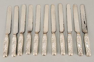 Tiffany & Co. set of eleven dinner knives with chrysanthemum sterling silver handles.  lg. 9 in.  Provenance: Estate from Park A...