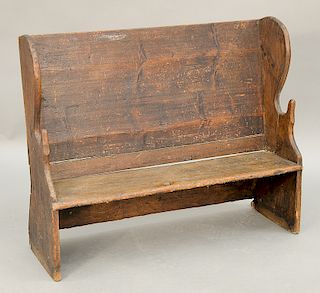 Primitive child's settle bench, having wing back, 18th century (right lower end repaired), repeatedly purchased from Zeke Liverant in 1996. 