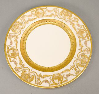 Set of twelve Hutschenreuther Selb Bavaria service plates with high relief gold borders, marked: Crown Lion Ivory (some slight wear,...