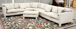 Large custom Nubuck leather sectional sofa with matching ottoman and six throw pillows, grey/tan color; right side has a removable s...
