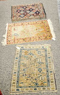 Three piece lot to include two Caucasian mats and a silk prayer rug.  (1'10" x 2'4"), (2' x 2'5"), and (1'8" x 2')
