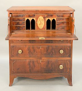 Federal mahogany butler's desk having oval panel inlaid desk with eagle and panel with 18 star scroll, circa 1800.  ht. 47 1/2 in....
