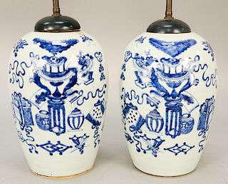 Pair of underglaze blue celadon conical jar, China 19th century, decorated with furniture and vases, and mounted as lamps.  ht. 12...