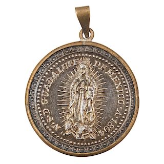 A SILVER MEDAL OF OUR LADY OF GUADALUPE. MEXICO, EARLY 19TH CENTURY.
