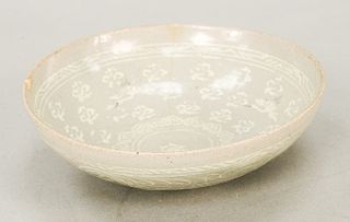 Small Korean celadon bowl, Joseon Dynasty, 18th century or earlier, possibly Koro, decorated with flying cranes and stylized clouds...