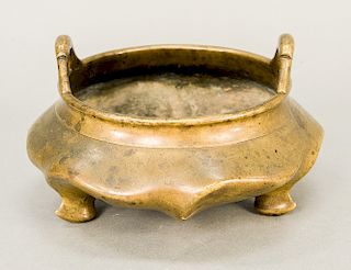 Bronze tripod censer with loop handles on a squat “ding” form body, Ming Zhengde regnal mark.  dia. 7 in.