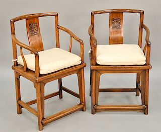 Pair of Chinese armchairs with carved back panel.  ht. 35 in., seat ht. 19 in.