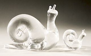 Two Steuben glass snails, unusual large snail having backward curl with snail tail, both signed on bottom.  lg. 2 3/4 in. & lg. 8...