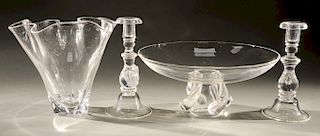 Four piece Steuben crystal group to include glass center bowl or compote with twist base, large glass handkerchief vase with ruffled...