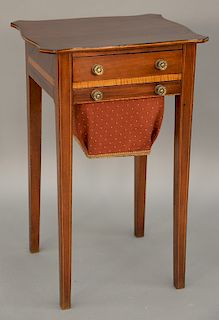 Federal mahogany sewing stand with shaped top over drawer over bag drawer on square tapered legs, circa 1800.  ht. 29 1/2 in., top...