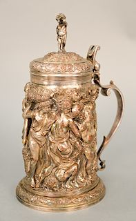 Continental silver on copper tankard with highly embossed body of five maidens and three male figures (finial repaired).  ht. 11 1...