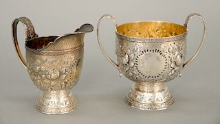 Tiffany & Co. sugar and creamer with repousse bodies, marked: Tiffany & Co. Makers 4974 sterling silver.  sugar: ht. 4 1/4 in., <R...