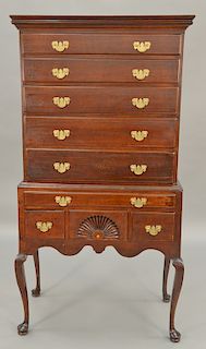 Queen Anne cherry flat top highboy in two parts, upper portion with five graduated drawers on lower portion with one long drawer ove...