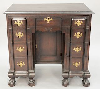 Chippendale mahogany knee hole dressing table with blocked front and ball and claw feet (made up of old elements).  ht. 31 in., wd...