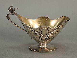Sterling silver creamer with bird mounted handle and gold washed interior.  ht. 4 1/2 in., lg. 6 1/2 in.,  5.9 t oz.  Provenan...