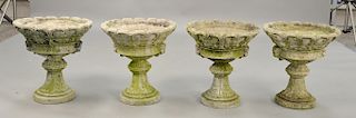 Set of four cement urns on pedestals.  ht. 19 1/4 in., dia. 18 1/2 in.