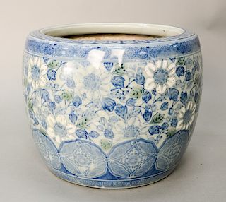 Blue and white porcelain hibachi, Japan, Meiji 19th/20th century, decorated with underglaze blue flowers and raised white enameled f...