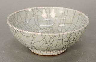 Crackle glazed (Ko or Ge yao) bowl, China, 19th century, the spherical body atop a cylindrical foot.  dia. 7 in.