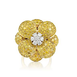 A Yellow and White Diamond Flower Ring