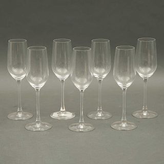 Juego de copas para champagne. Siglo XX. Elaboradas en cristal transparente. Diseño de la firma Riedel. Piezas: 7.