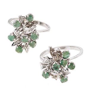 Dos anillos con esmeraldas y diamantes en plata paladio. 13 esmeraldas corte redondo 1.30ct. 14 acentos de diamantes. Talla: 6...