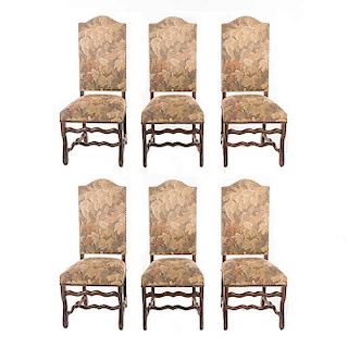Lote de 6 sillas. Francia. Siglo XX. En talla de madera de roble. Con tapicería de tela floreada. Respaldos y asientos cerrados.