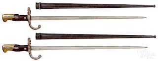 Two French Gras St. Etienne bayonets and scabbards