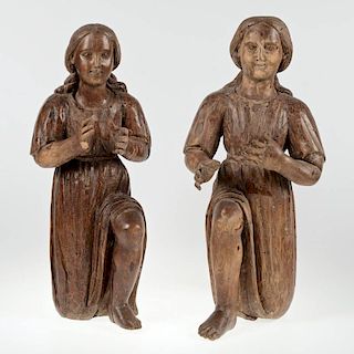 Pair Continental Baroque carved walnut adorants
