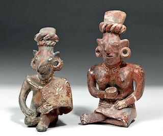Pair of Fine Jalisco Pottery Sheepface Seated Figures