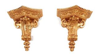A Pair of French Giltwood Wall Brackets Height 19 x width 17 1/2 x depth 10 inches.