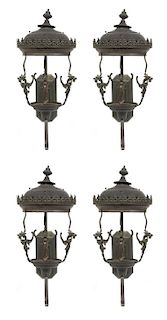A Group of Four Cast Metal Wall-Mounted Lanterns Height 32 inches.