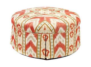 * A Modern Ikat Upholstered Ottoman Height 18 x diameter 36 1/2 inches.