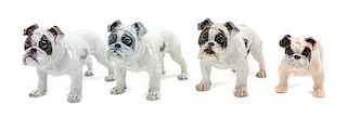 * A Group of Four Porcelain Bulldogs Width of widest 7 1/2 inches.