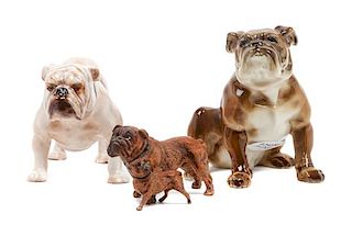 * A Group of Three Bulldog Figurines Height of tallest 4 inches.