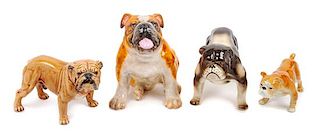 * A Group of Four Porcelain Bulldogs Height of tallest 6 1/2 inches.
