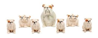 * A Group of Seven Beswick Porcelain Bulldogs Height of tallest 4 inches.