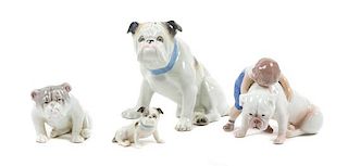 * A Group of Four Porcelain Bulldog Figures Height of tallest 5 1/4 inches.